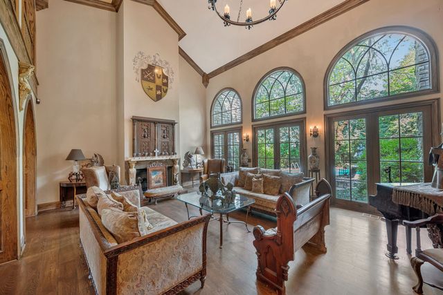 a view of hall way with furniture