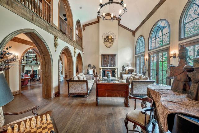 a backyard of a house with outdoor seating