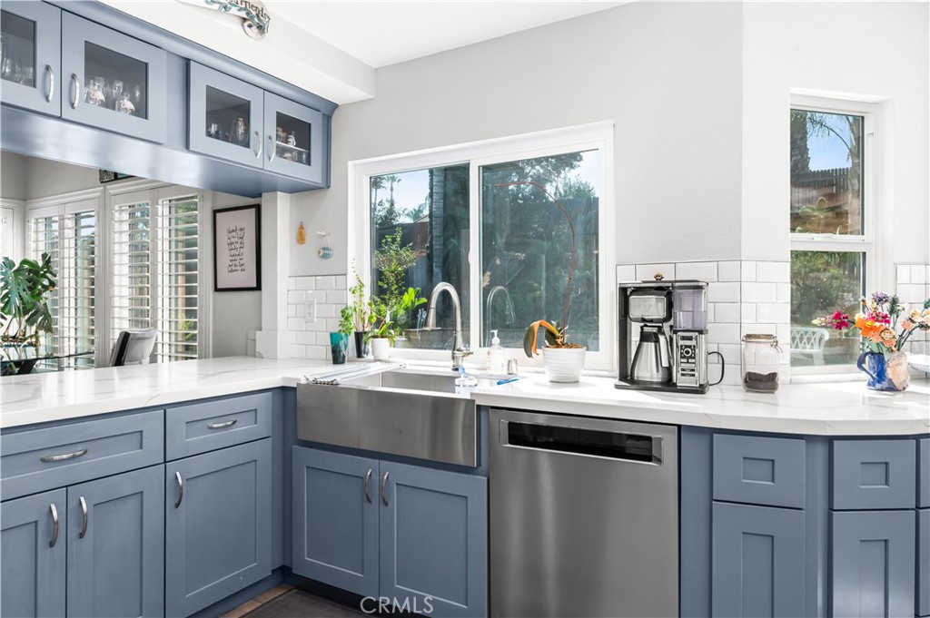 19465 Kinnow Lane Riverside, CA 92508 - Photo 14 of 61 a kitchen with a sink and cabinets