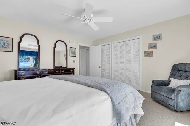 a bed room with a bed and a couch