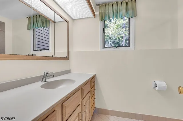 a bathroom with a shower and a toilet