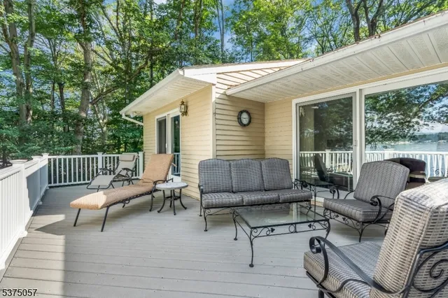 a view of a backyard with large trees