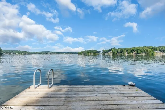 a view of a lake from a balcony