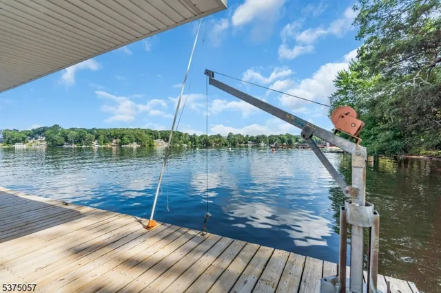 a view of a swimming pool with a yard