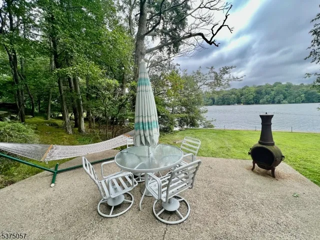 a very nice looking dining room with a large window