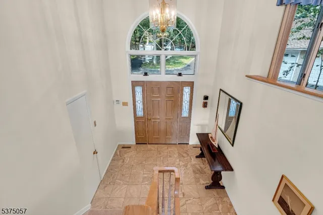 a view of a hallway with windows