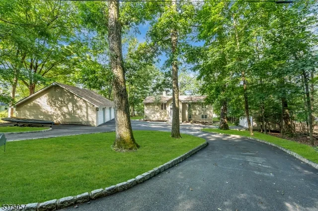 a view of a lake with houses in the back