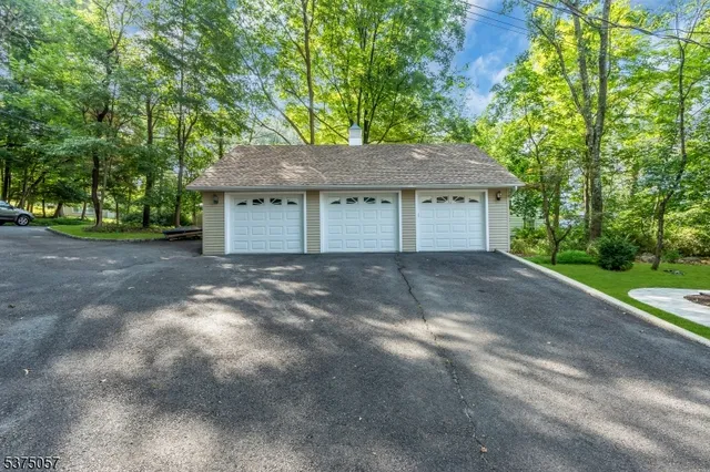a view of a lake with houses in the back