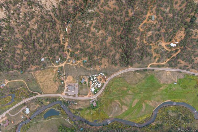 a view of a town with mountains in the background