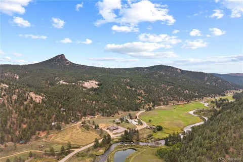 a view of a city with mountains in the background