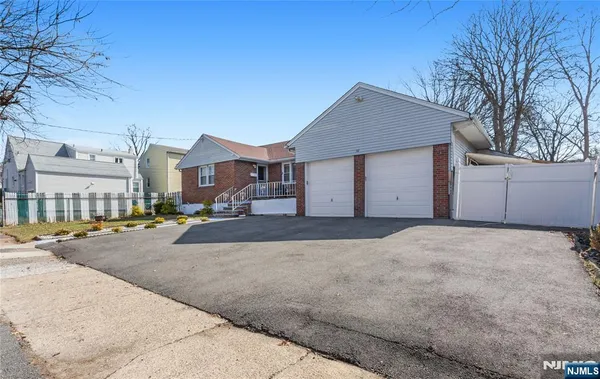 a view of a street with a house