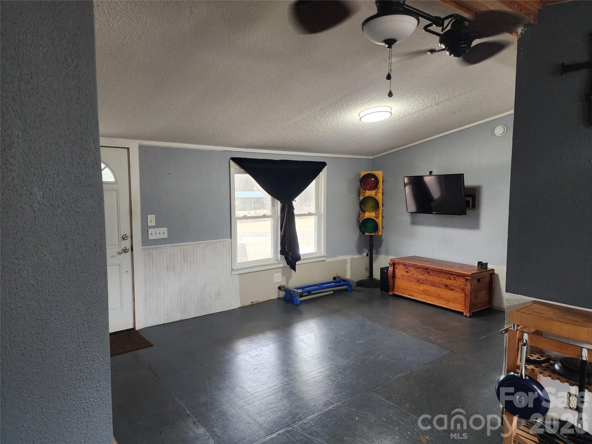 303 Johnson Dairy Road Mooresville, NC 28115 - Photo 12 of 36 an empty room with windows