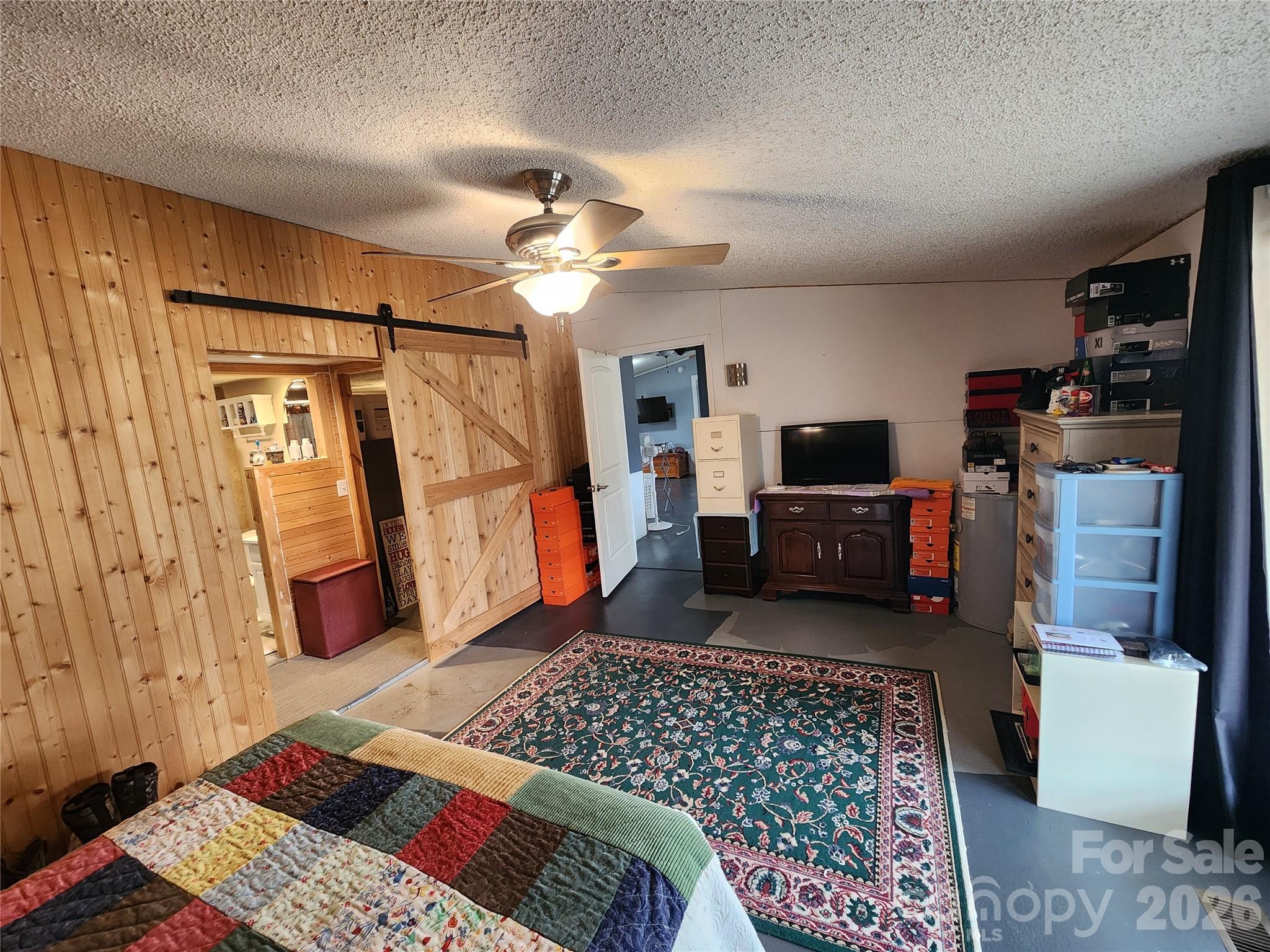 303 Johnson Dairy Road Mooresville, NC 28115 - Photo 21 of 36 a bedroom with a bed and furniture