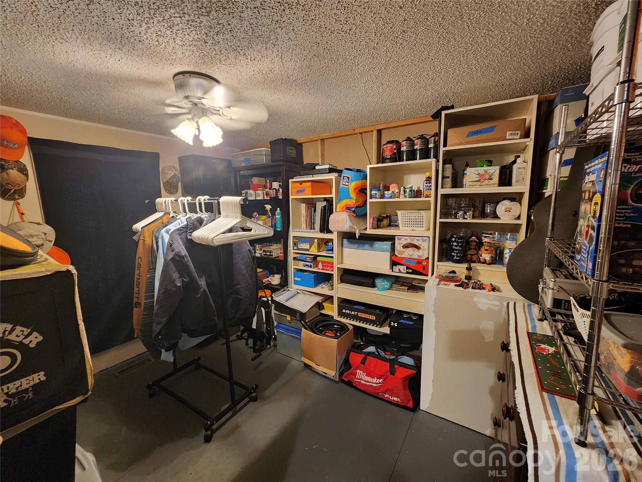 303 Johnson Dairy Road Mooresville, NC 28115 - Photo 24 of 36 a view of a room with gym equipment