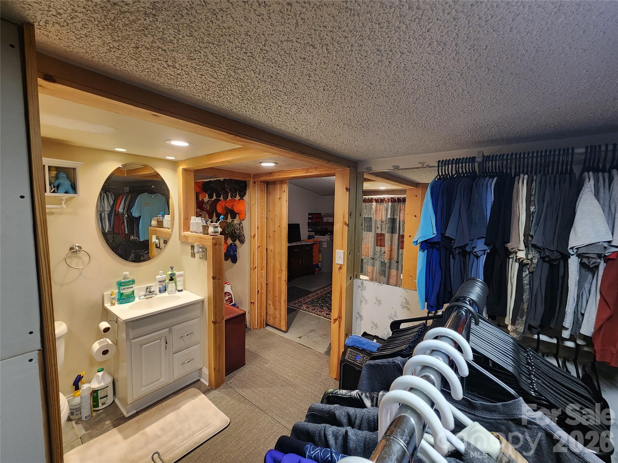 303 Johnson Dairy Road Mooresville, NC 28115 - Photo 28 of 36 a room with furniture and a mirror