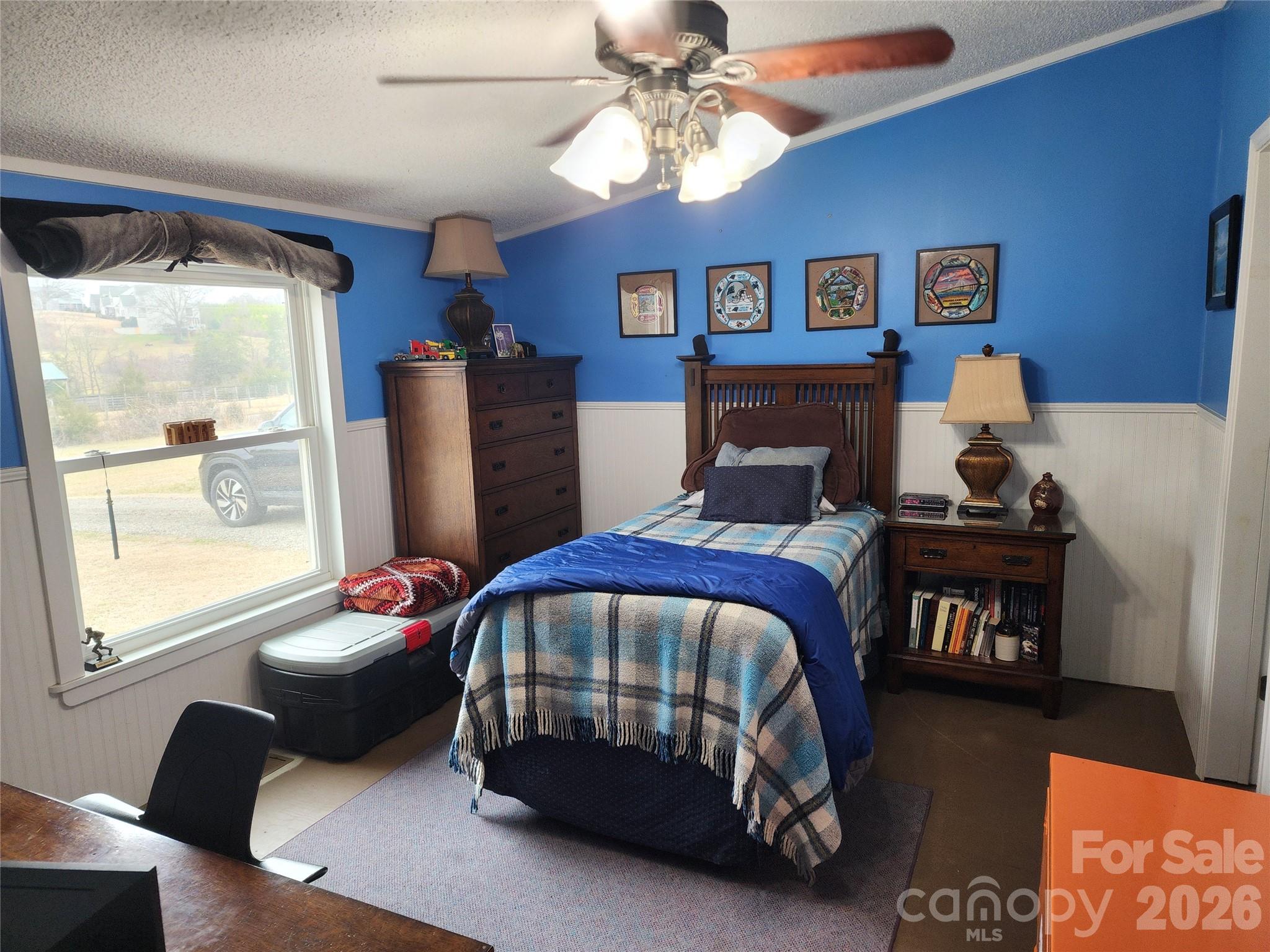303 Johnson Dairy Road Mooresville, NC 28115 - Photo 29 of 36 a bedroom with bed and a window
