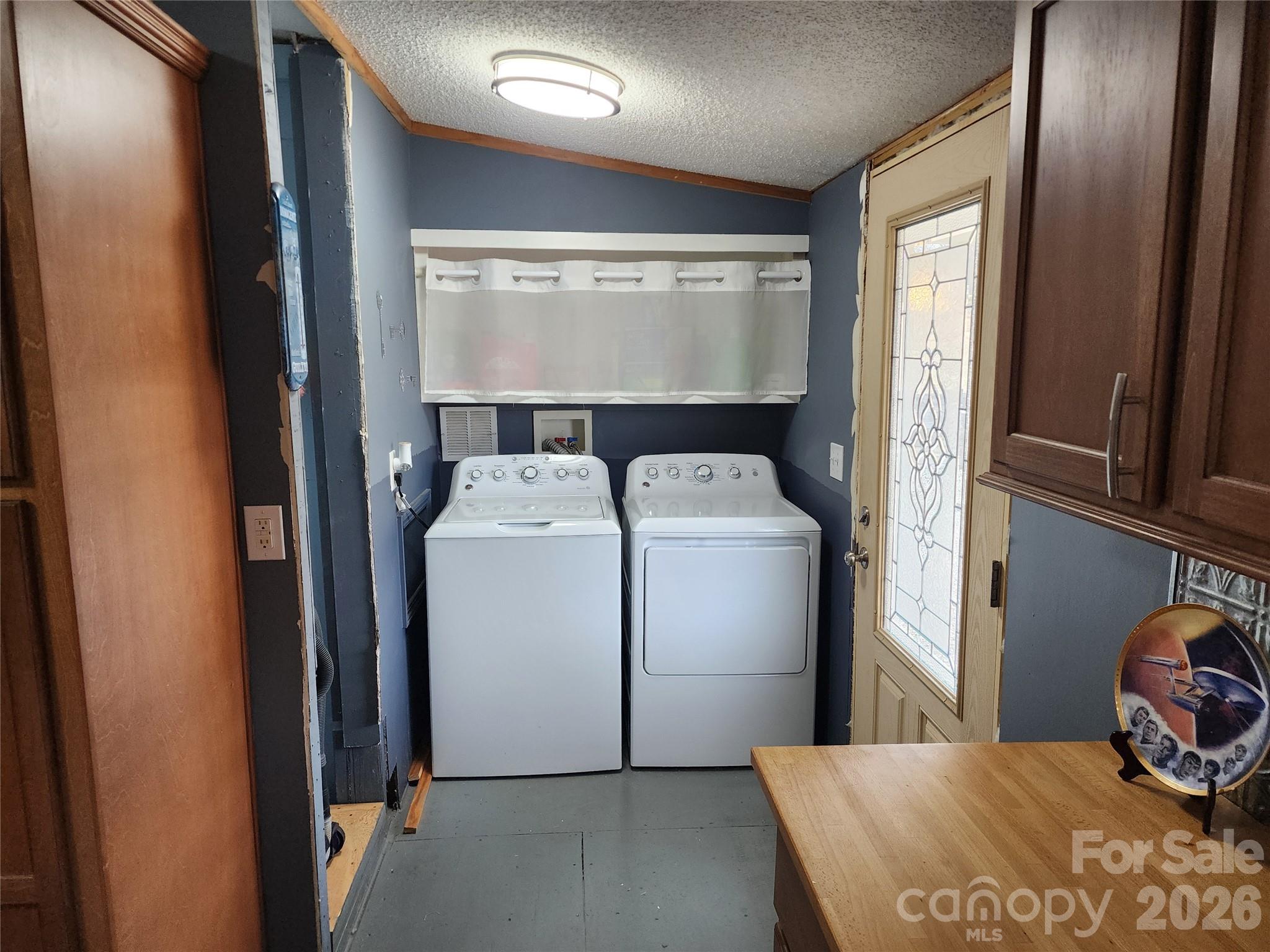 303 Johnson Dairy Road Mooresville, NC 28115 - Photo 32 of 36 a room with dryer and washer