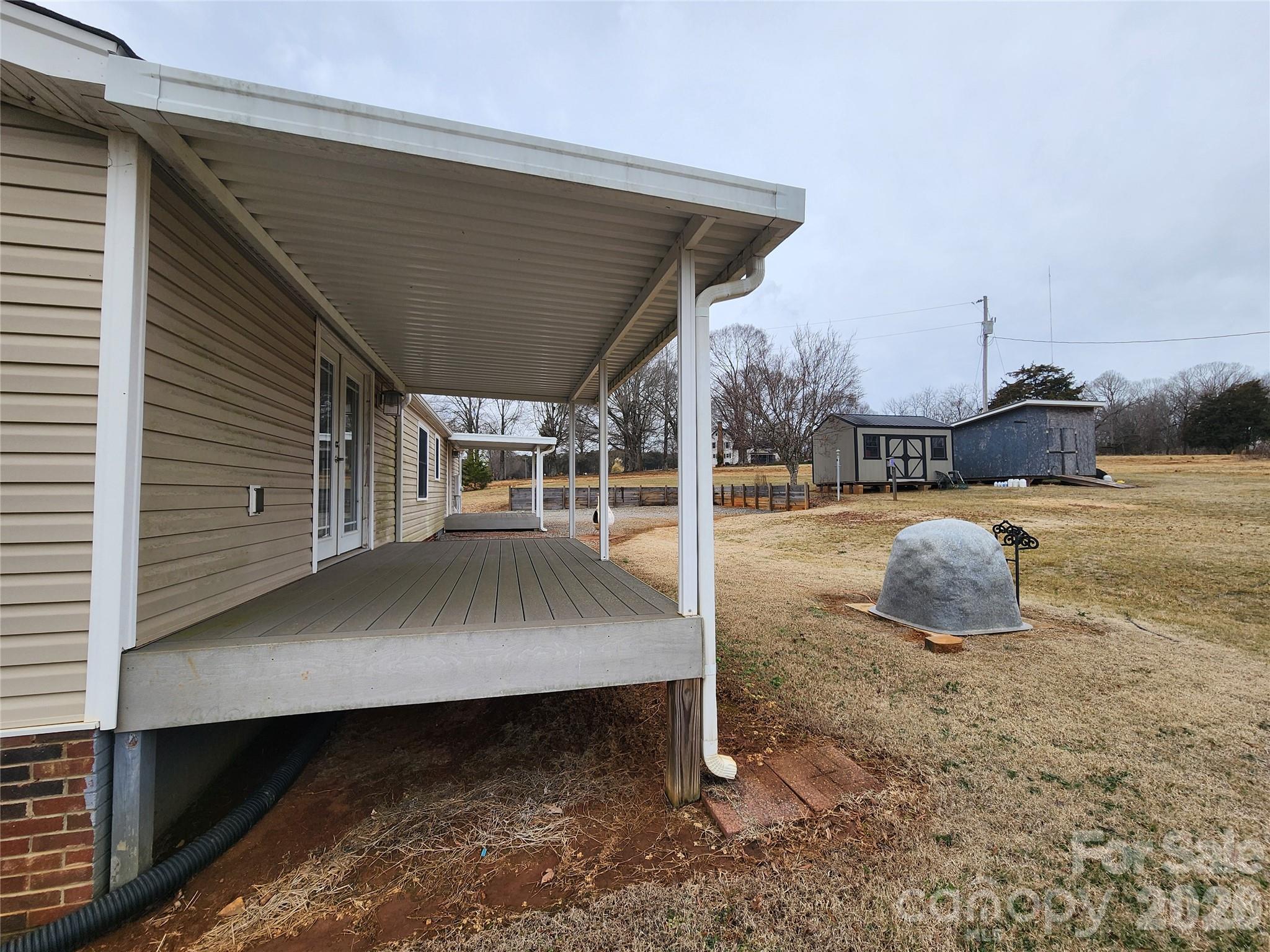303 Johnson Dairy Road Mooresville, NC 28115 - Photo 34 of 36 a view of outdoor space and deck