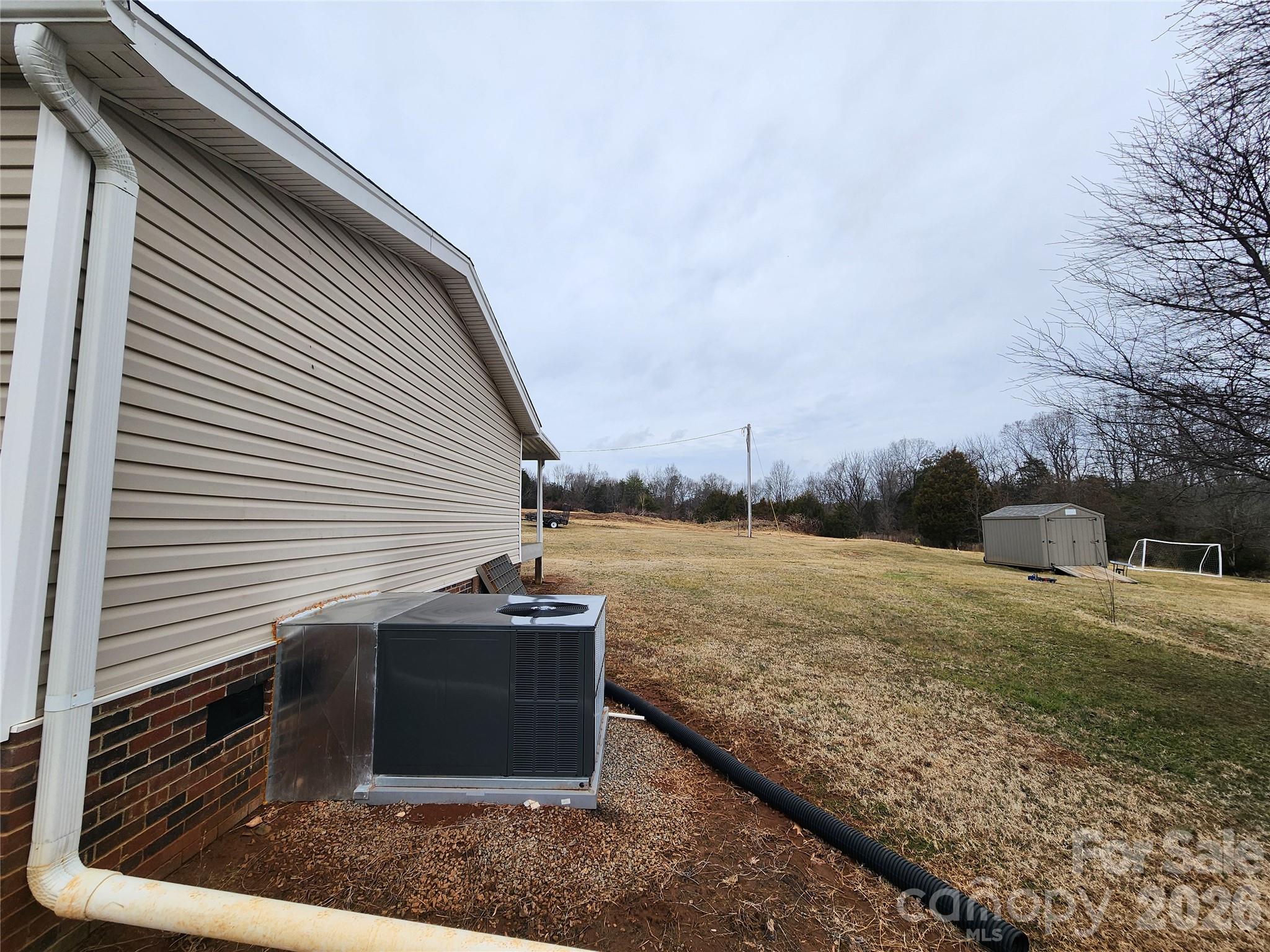 303 Johnson Dairy Road Mooresville, NC 28115 - Photo 35 of 36 a view of a terrace with yard