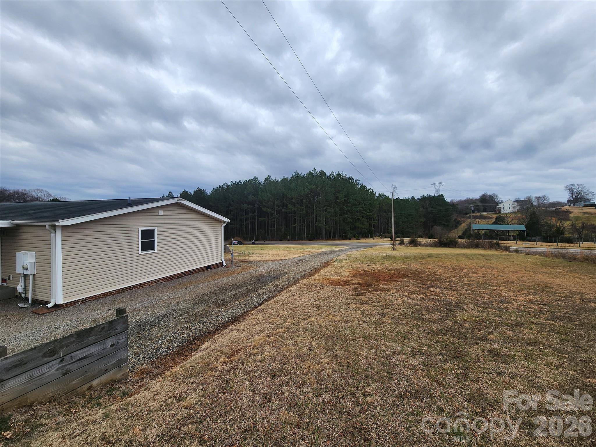 303 Johnson Dairy Road Mooresville, NC 28115 - Photo 6 of 36 a view of house and outdoor space