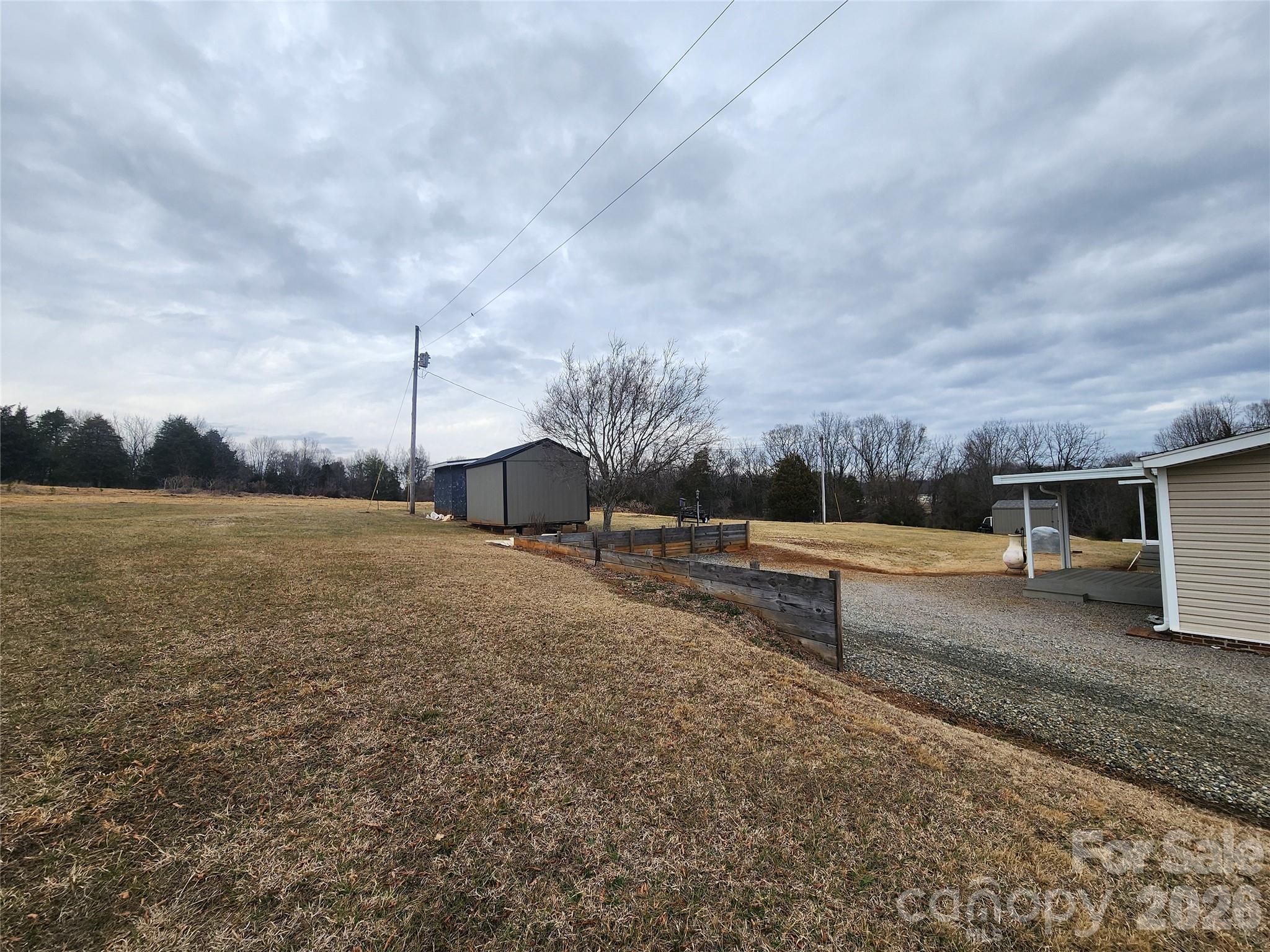 303 Johnson Dairy Road Mooresville, NC 28115 - Photo 8 of 36 a view of a backyard