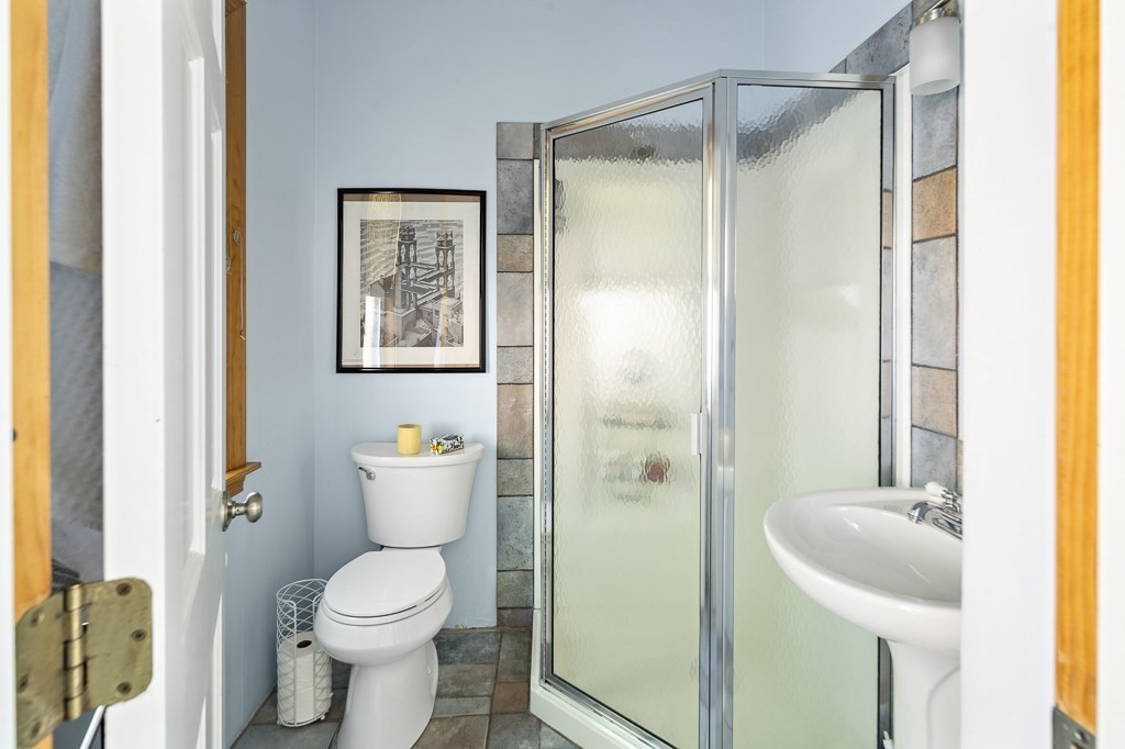 10 Spring Hill Terrace Somerville, MA 02143 - Photo 19 of 20 a bathroom with a toilet and a sink