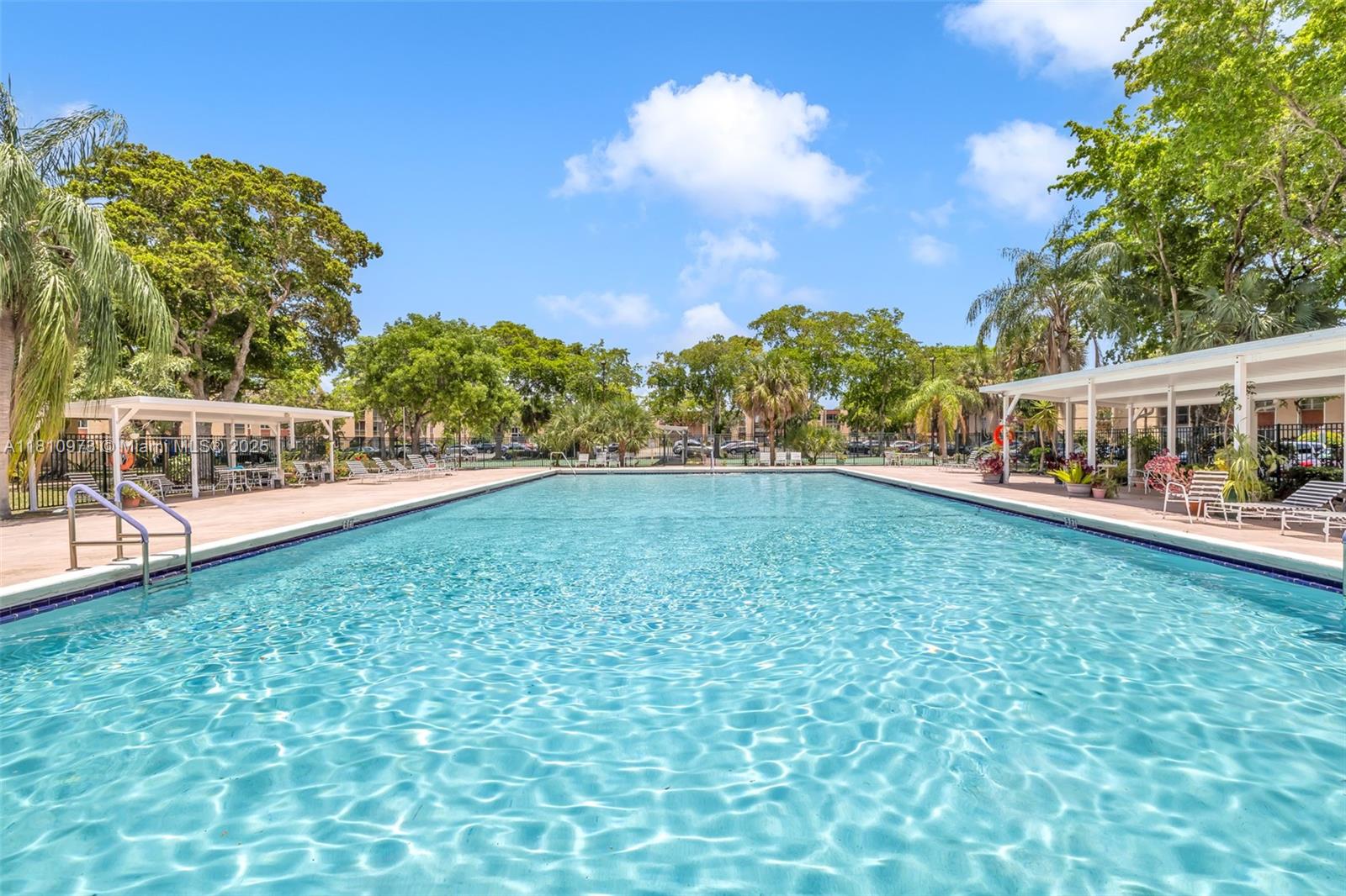 2316 Southwest 81st Way, Unit 8 North Lauderdale, FL 33068 - Photo 26 of 33 a view of a house with a yard