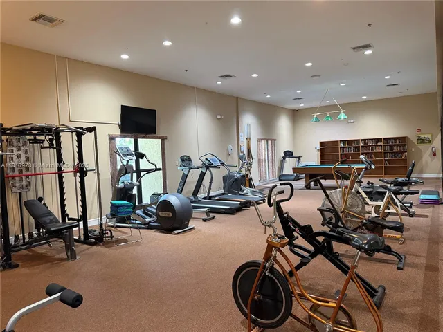 a view of a room with gym equipment