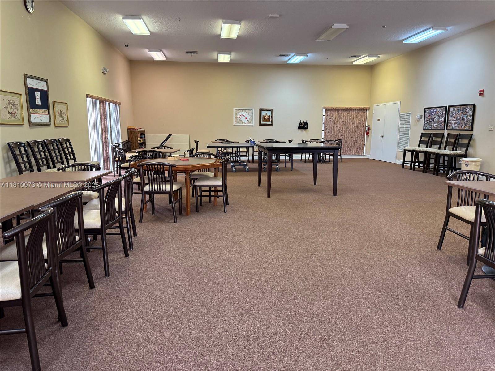 2316 Southwest 81st Way, Unit 8 North Lauderdale, FL 33068 - Photo 31 of 33 a group of people sitting in a room