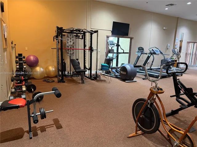 a view of a room with gym equipment