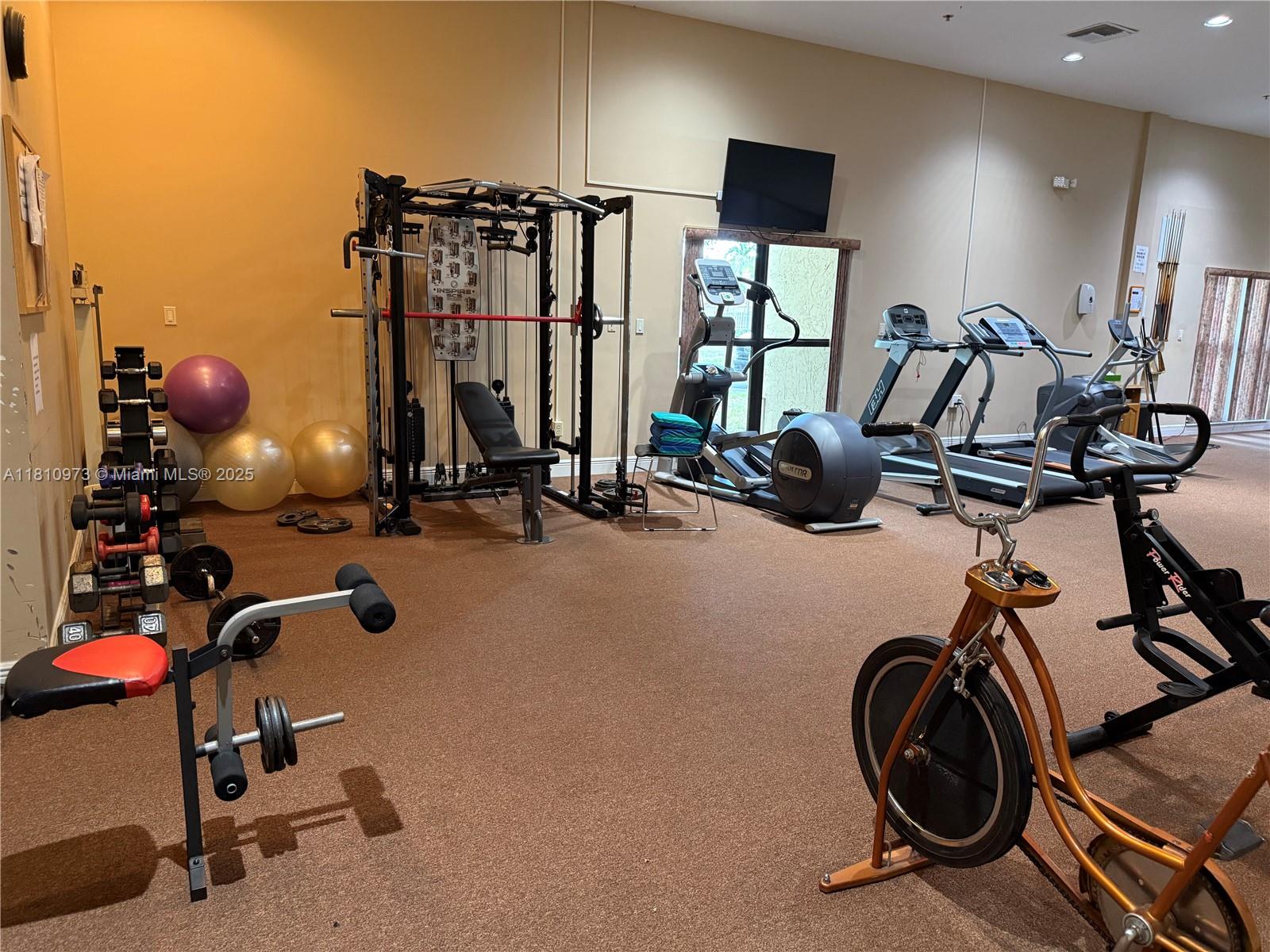 2316 Southwest 81st Way, Unit 8 North Lauderdale, FL 33068 - Photo 33 of 33 a view of a room with gym equipment