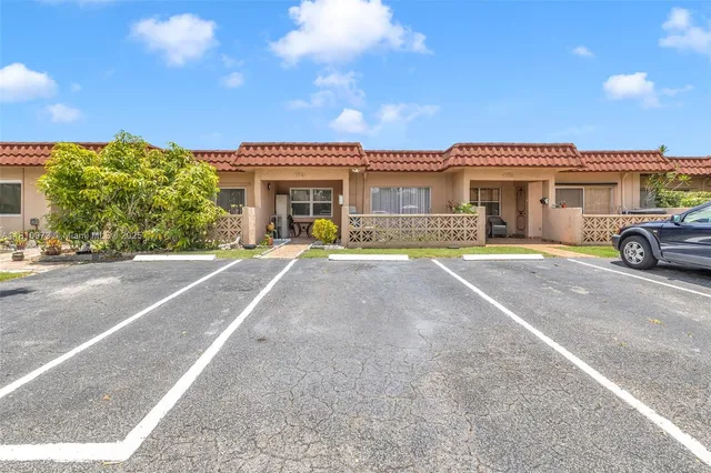 front view of a house with a patio