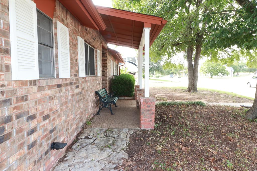 212 Palmer Drive Comanche, TX 76442 - Photo 30 of 40 a view of a backyard with garden