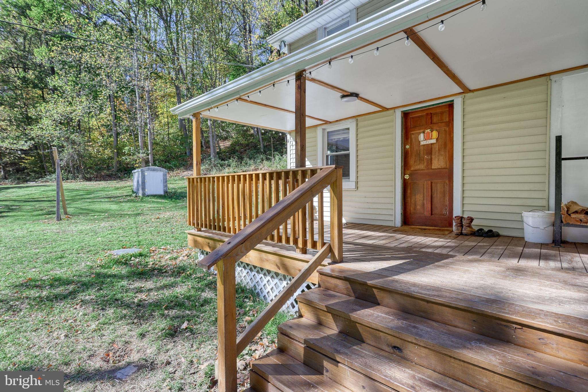 15120 Laurel Road Felton, PA 17322 - Photo 17 of 67 a view of backyard with deck and wooden floor