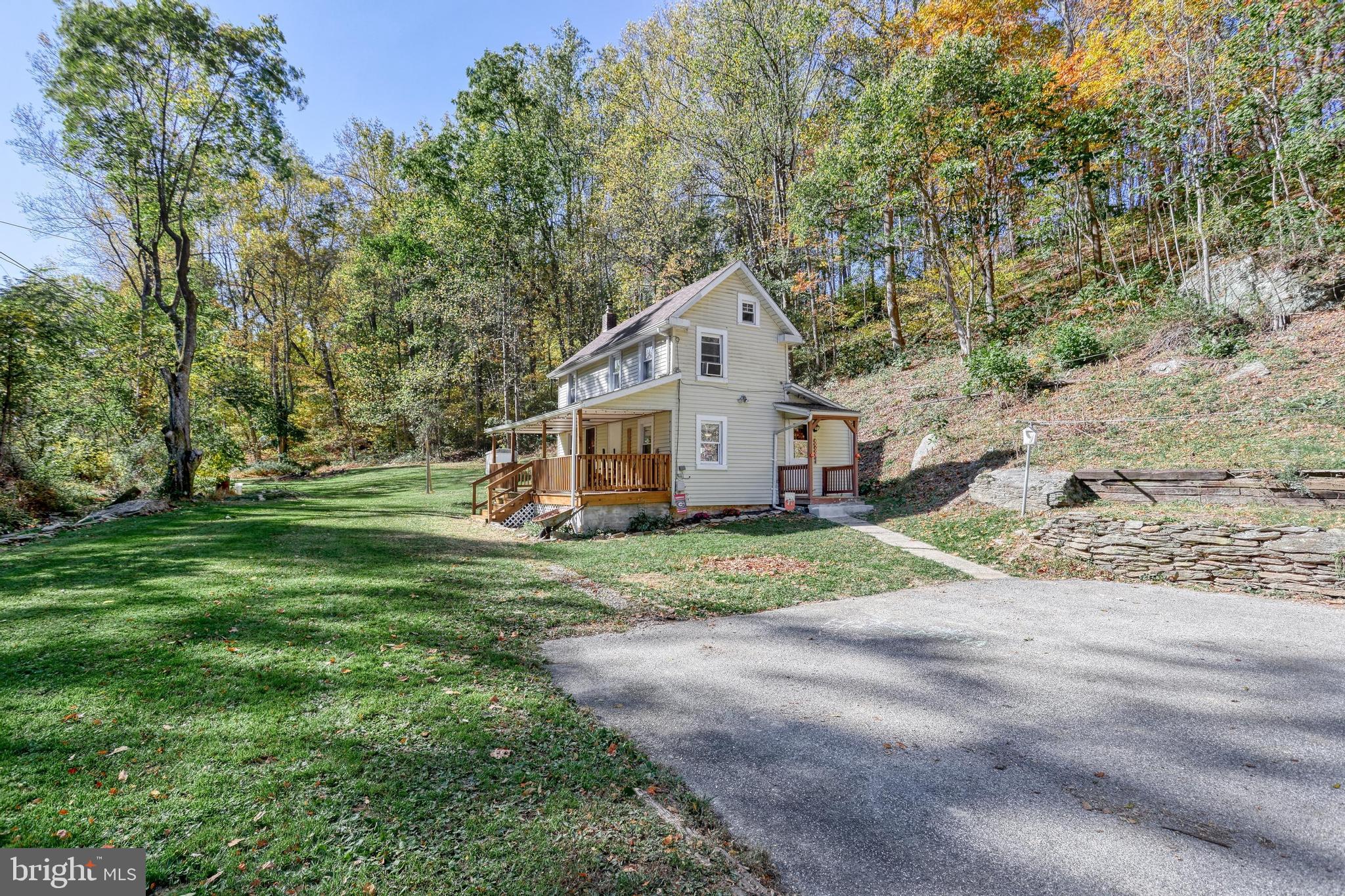 15120 Laurel Road Felton, PA 17322 - Photo 6 of 67 a view of a house with yard and sitting area