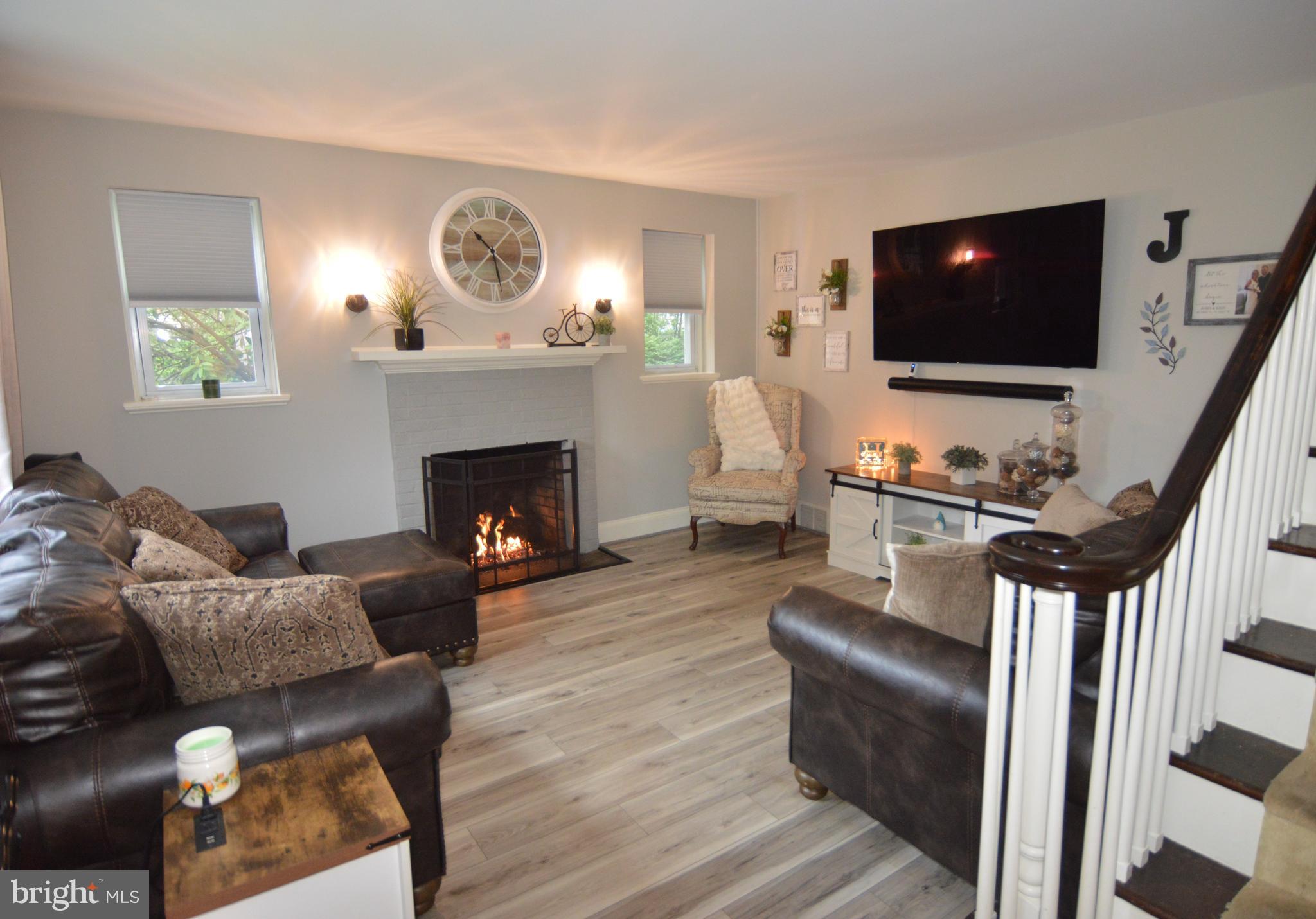 46 Bright Road Hatboro, PA 19040 - Photo 2 of 25 a living room with furniture and a flat screen tv