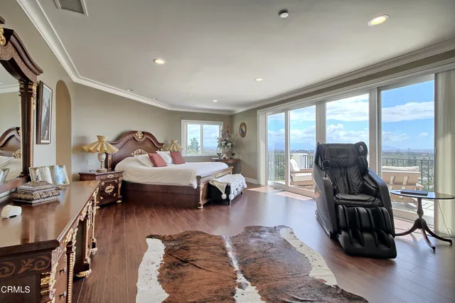 a spacious bathroom with a tub shower and window