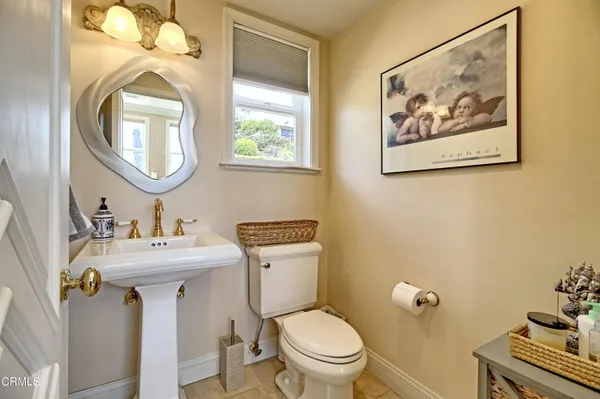 a view of a patio with couches and a potted plant