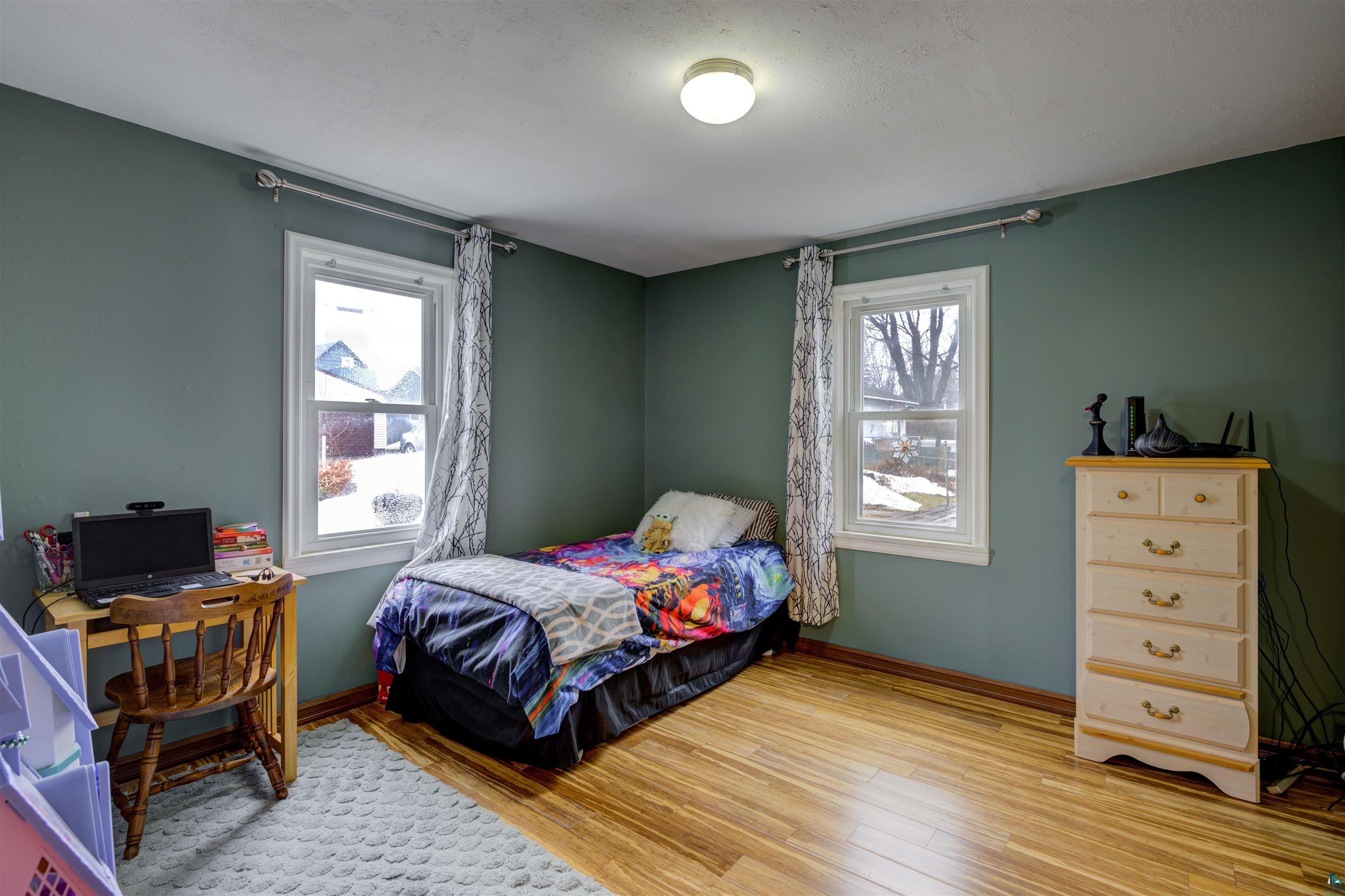 136 2nd Street Proctor, MN 55810 - Photo 8 of 21 Second generous-sized bedroom located on main floor.