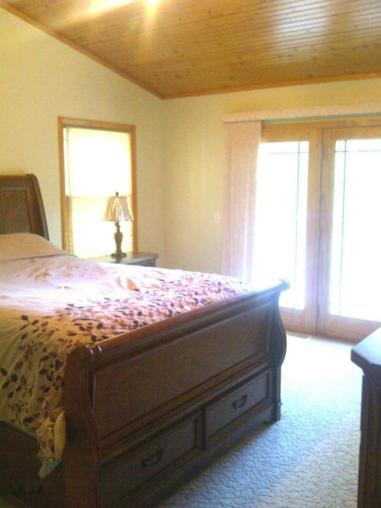 293 West Fruitvale Road Montague, MI 49437 - Photo 10 of 23 master bed