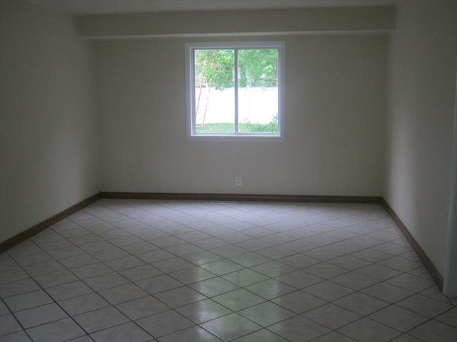 532 Spruce Road Bolingbrook, IL 60440 - Photo 2 of 21 an empty room with a window