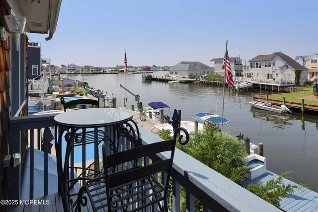 a view of a chairs on the roof deck