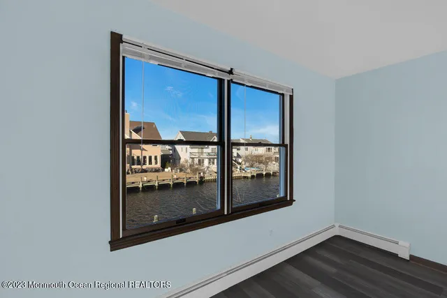 a view of a glass door and a window