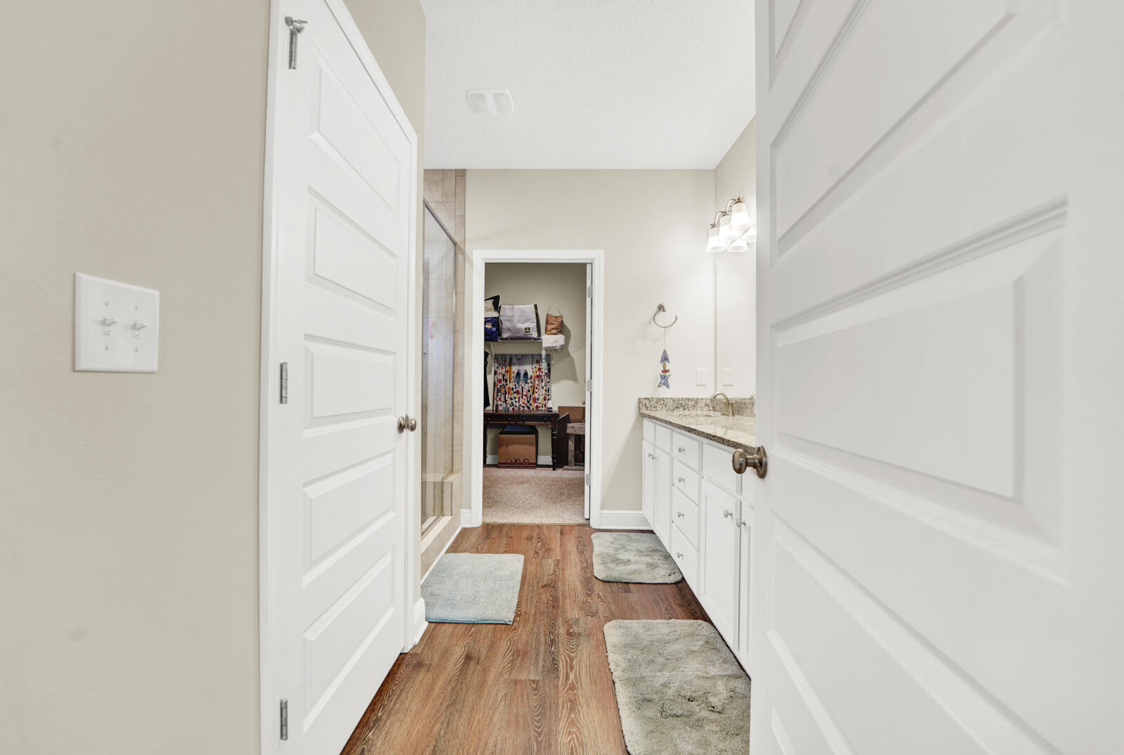 412 Lightning Bug Lane Freeport, FL 32439 - Photo 19 of 52 a view of a kitchen with wooden floor and electronic appliances
