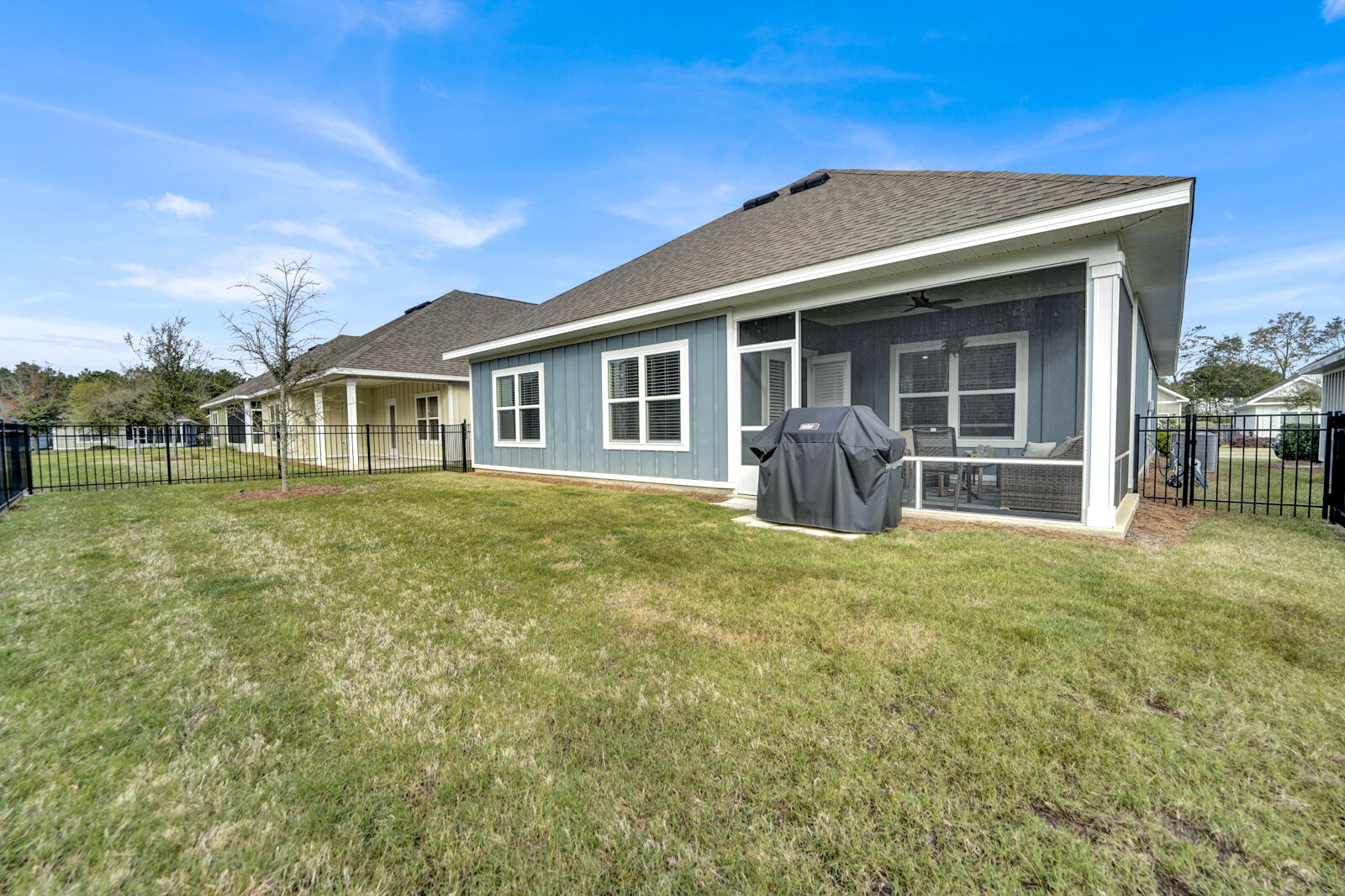 412 Lightning Bug Lane Freeport, FL 32439 - Photo 29 of 52 a front view of a house with a garden