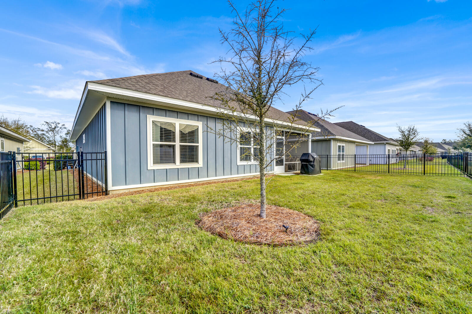 412 Lightning Bug Lane Freeport, FL 32439 - Photo 30 of 52 a house with swimming pool in front of it