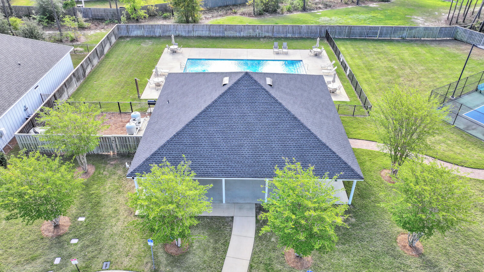 412 Lightning Bug Lane Freeport, FL 32439 - Photo 33 of 52 a view of a backyard with plants