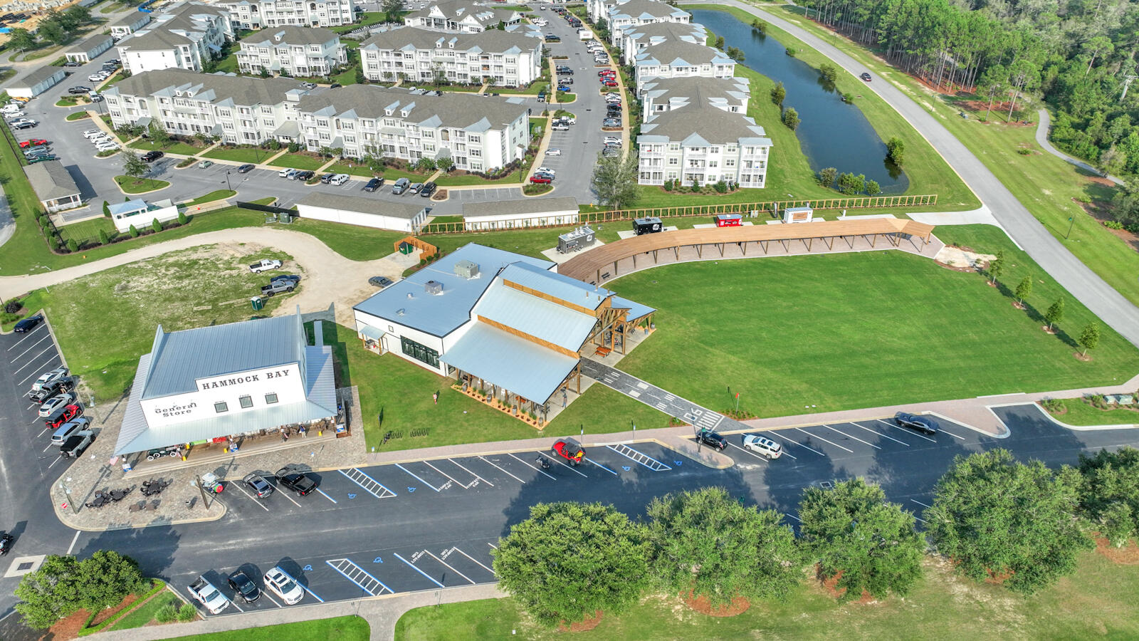 412 Lightning Bug Lane Freeport, FL 32439 - Photo 40 of 52 an aerial view of a house with a garden and lake view