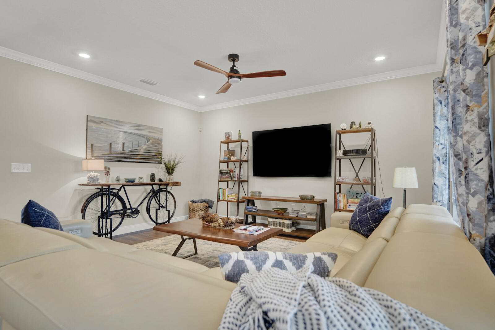 412 Lightning Bug Lane Freeport, FL 32439 - Photo 9 of 52 a living room with furniture and a flat screen tv