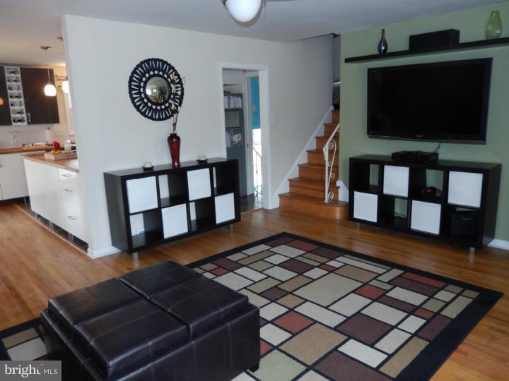 1241 Dill Road Havertown, PA 19083 - Photo 3 of 14 a living room with furniture and a flat screen tv